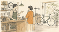 自転車店で車体への部品取付について相談する様子を描いたイラスト